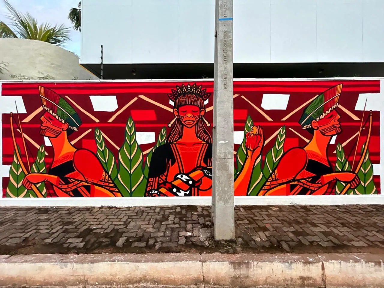 Mulher e onças, Muro de rua